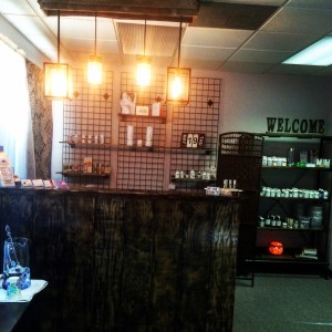 The front desk area featuring refurbished and recycled wood fixtures